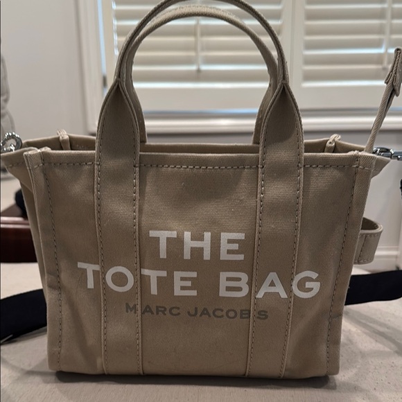 Marc Jacobs Handbags - Marc Jacobs Tan Tote Bag with Bold Text and Sturdy Handles